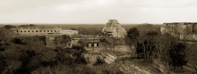 a sepia toned panormaic view of the temples at Uxmal, Mexico